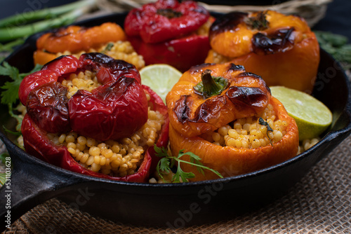 Vegan cous cous stuffed bell peppers