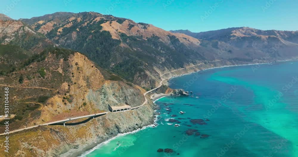 Travelling pacific road highway. Car driving under the Rock Shed on California. Travelling pacific road highway. Car driving under the Rock Shed on California.