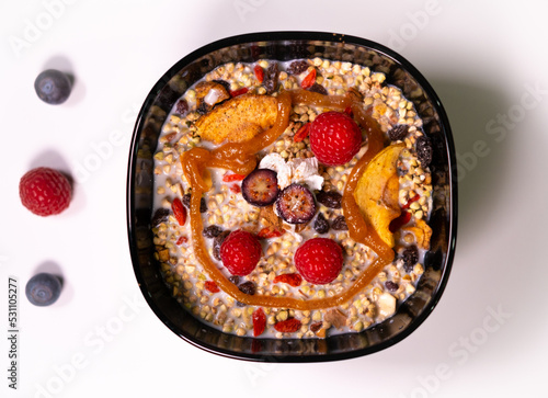 breakfast granola bowl with berries  photo