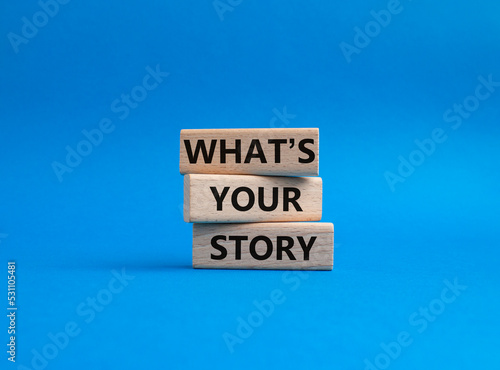 What's your story symbol. Concept words What's your story on wooden blocks. Beautiful blue background. Business and What's your story concept. Copy space.