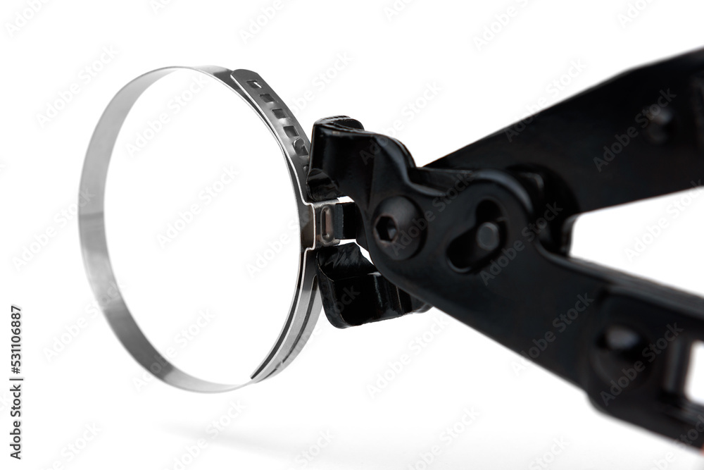 Red pliers for steel belt clamps isolated on white background. Red pliers for steel belt clamps isolated on white background.