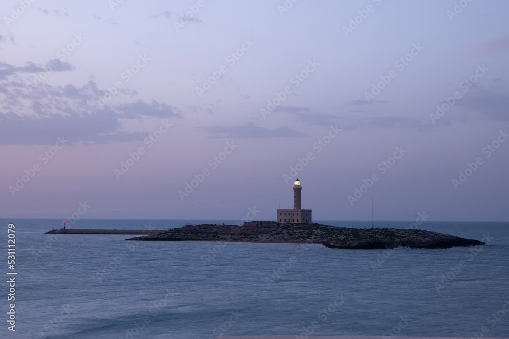 Vieste, view of the island and the lighthouse at sunset