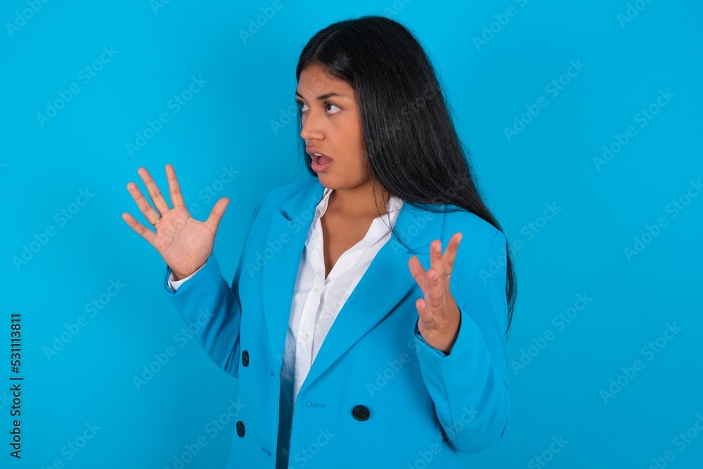MODEL shouts loud, keeps eyes opened and hands tense. MODEL shouts loud, keeps eyes opened and hands tense.