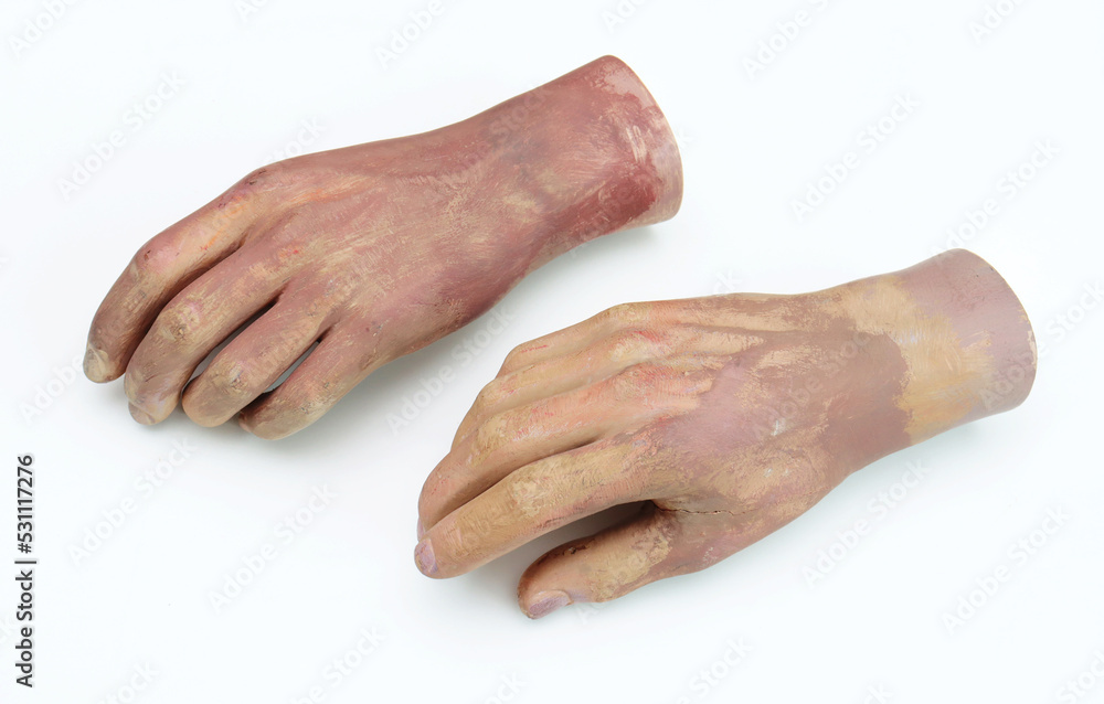 Part of a man's plastic arms from a mannequin.