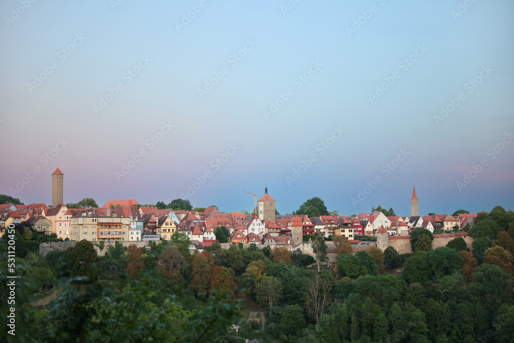 Cityscape of european village with several towers and churches medieval city
