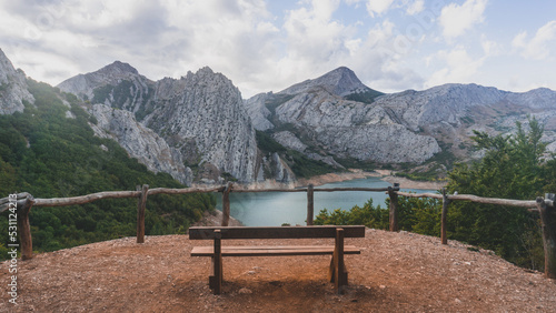 Bench in the mountains with a beautiful view of the lake 