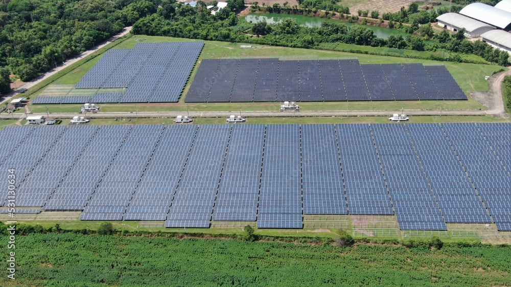 Solar energy farm. Aerial view of a solar farm in Asia. Solar energy farm. Aerial view of a solar farm in Asia.