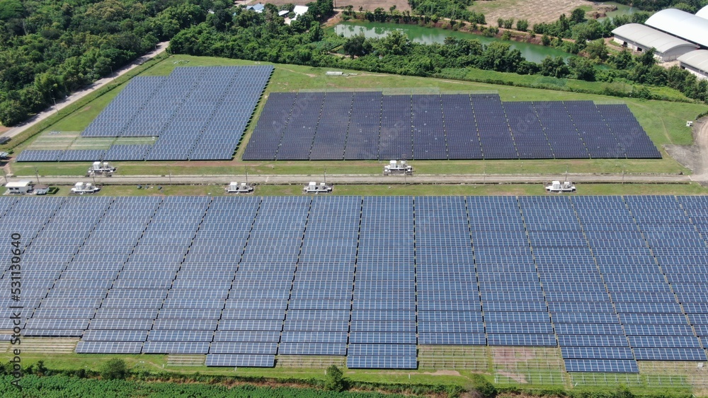 Solar energy farm. Aerial view of a solar farm in Asia. Solar energy farm. Aerial view of a solar farm in Asia.