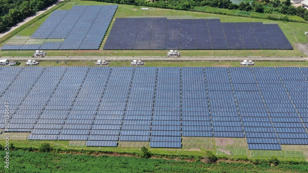 Solar energy farm. Aerial view of a solar farm in Asia. Solar energy farm. Aerial view of a solar farm in Asia.