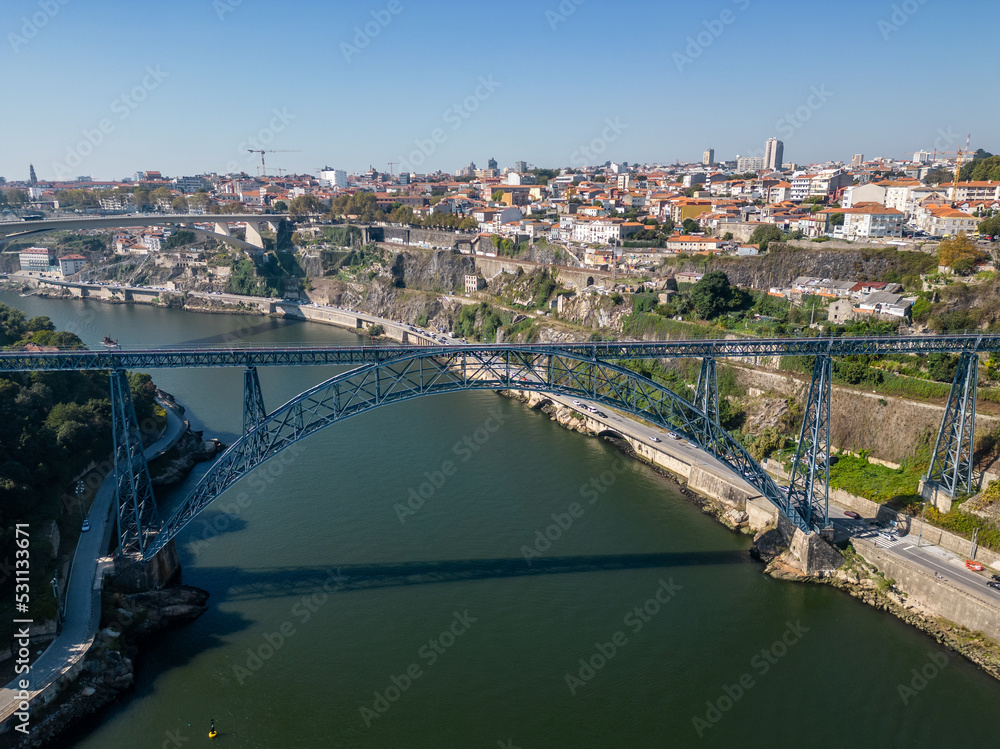 Aerial view of Porto, Douro River with boats and the bridges