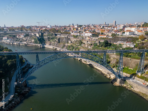 Aerial view of Porto, Douro River with boats and the bridges