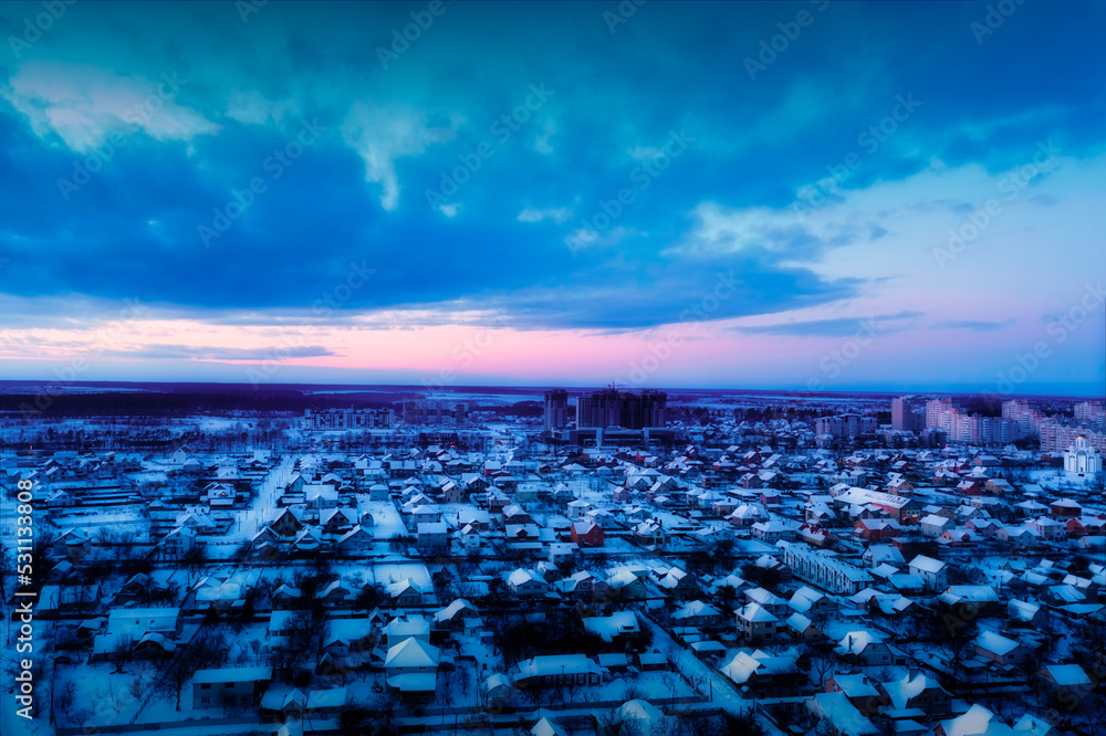 Fototapeta premium Evening cottage district, suburbs, drone view. View of the city