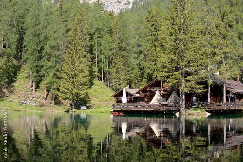 House in a lake. Beautiful wood house in the alps