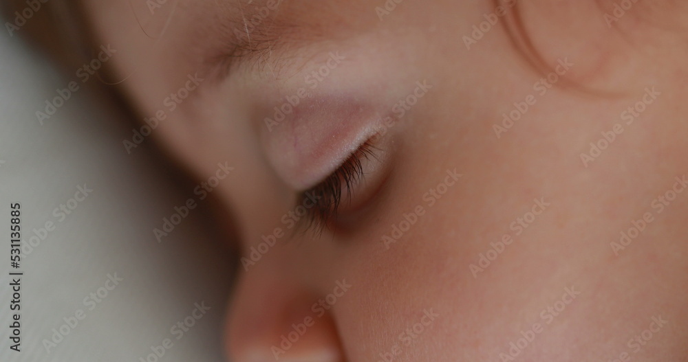 Baby sleeping close-up macro face . Infant boy drooling during afternoon nap asleep Baby sleeping close-up macro face . Infant boy drooling during afternoon nap asleep