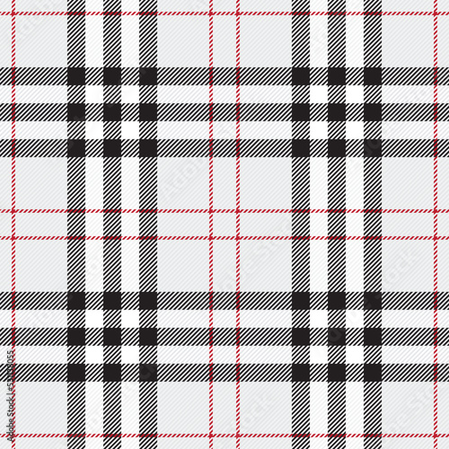 Traditional Scottish checkered plaid ornament. Vintage tartan texture seamless pattern. Coloured geometric intersecting striped vector illustration. Seamless fabric texture.