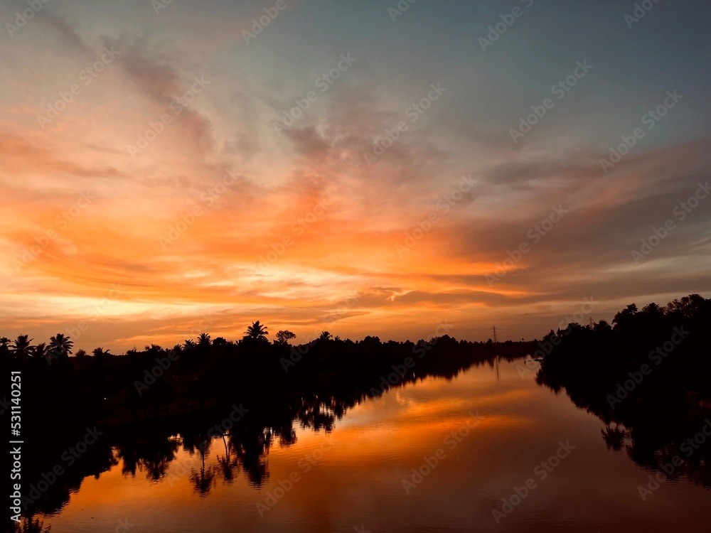 Fototapeta premium sunset over the lake
