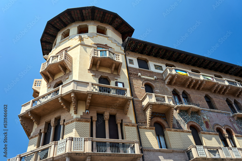 facade of a historic townhouse with balcony and shutters in the city of Padua