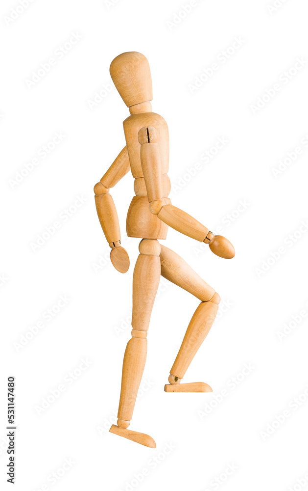 Wooden mannequin walking or climbing up the stairs Wooden mannequin walking or climbing up the stairs