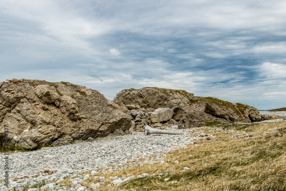 Sea stacks and caves at low tide. Arches Provincial Park, Newfoundland, Canada Sea stacks and caves at low tide. Arches Provincial Park, Newfoundland, Canada