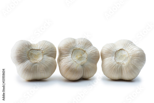 Garlics (Allium sativum) isolated on white. A differnt aspect of garlic.