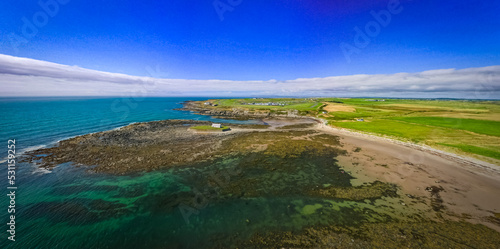 Panorama of St Cwyfan Church in the sea, Anglesey, Wales. 