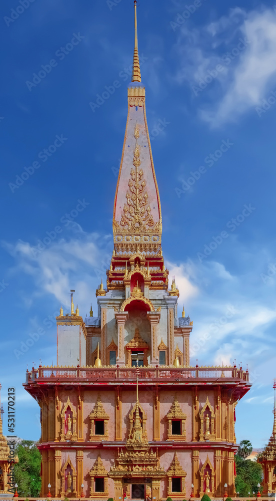 Wat Chalong Buddhist temples in Phuket Thailand. Decorated in beautiful ornate colours of red and Gold and Blue. Lovely sunset. Wat Chaithararam
