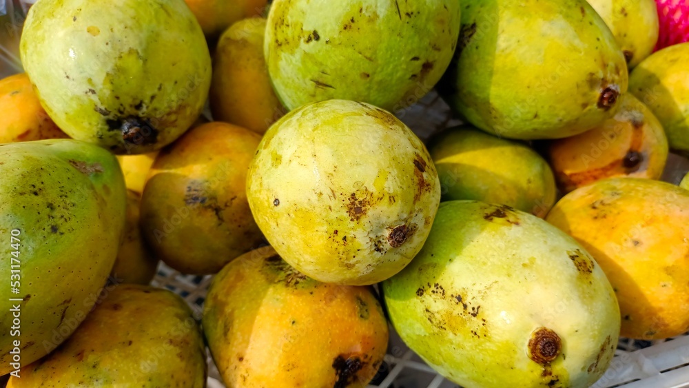 Gedong mango is green, bright orange and the texture of the flesh is soft