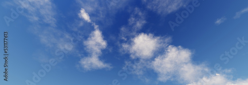 Blue sky and white clouds floated in the sky on a clear day with warm sunshine