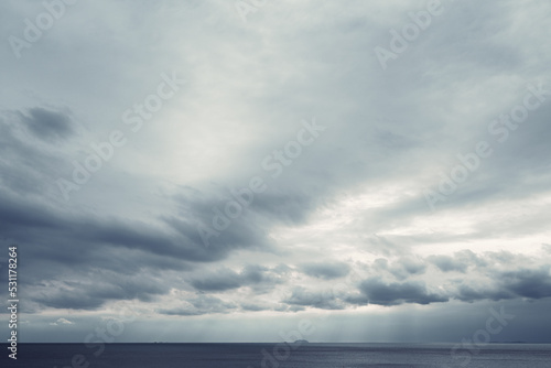 dark blue sea background  moody sky