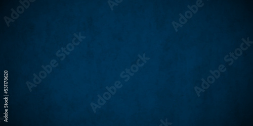 Dark Blue background with grunge backdrop texture, watercolor painted mottled blue background, colorful bright ink and watercolor textures on white paper background. 