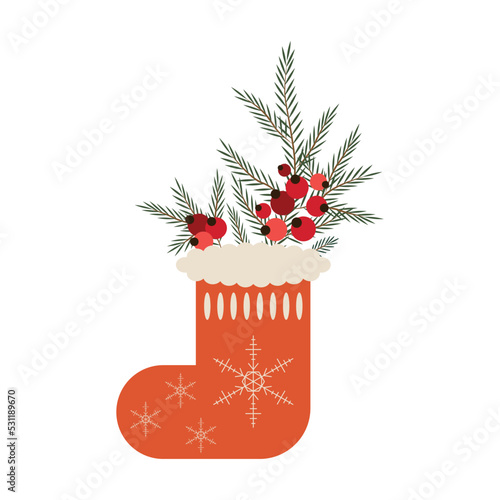 Christmas red sock decorated with spruce branches