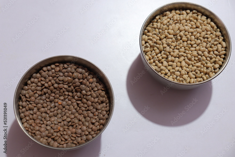 Horse gram or Macrotyloma uniflorum and Cow Peas isolated on white background Horse gram or Macrotyloma uniflorum and Cow Peas isolated on white background