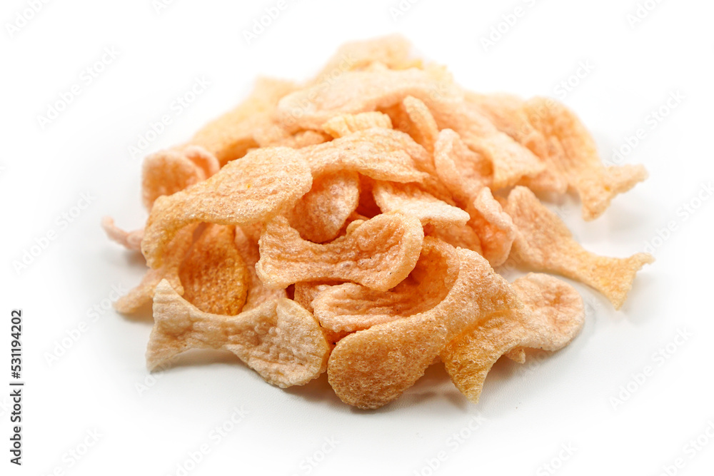 Fried prawn crackers or shrimp crackers in the shape of red fish