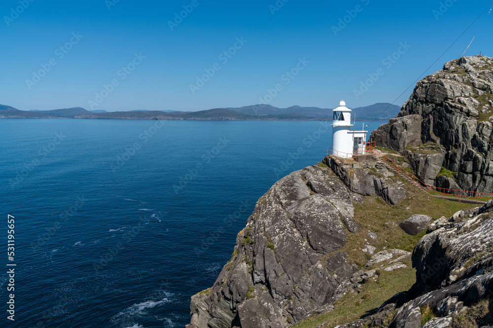 view of the historic Sheep's Head Lighthouse on the Muntervary Peninsula in County Cork of Ireland