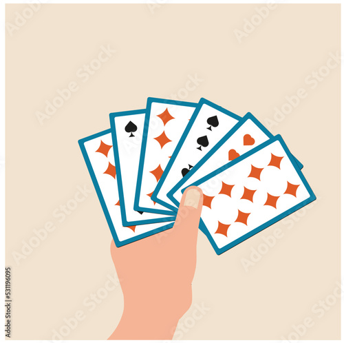 playing cards in hand