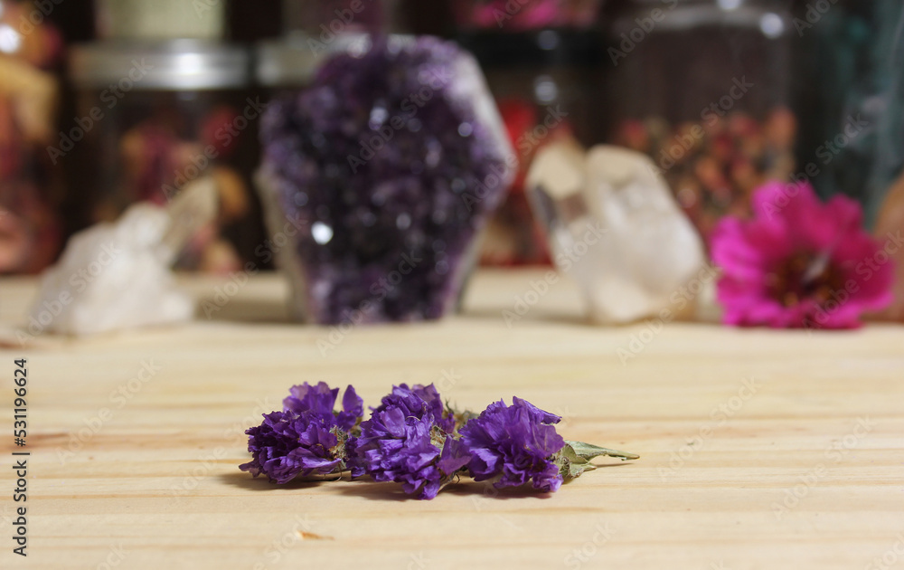 Amethyst Crystals With Flowers on Meditation Table Amethyst Crystals With Flowers on Meditation Table