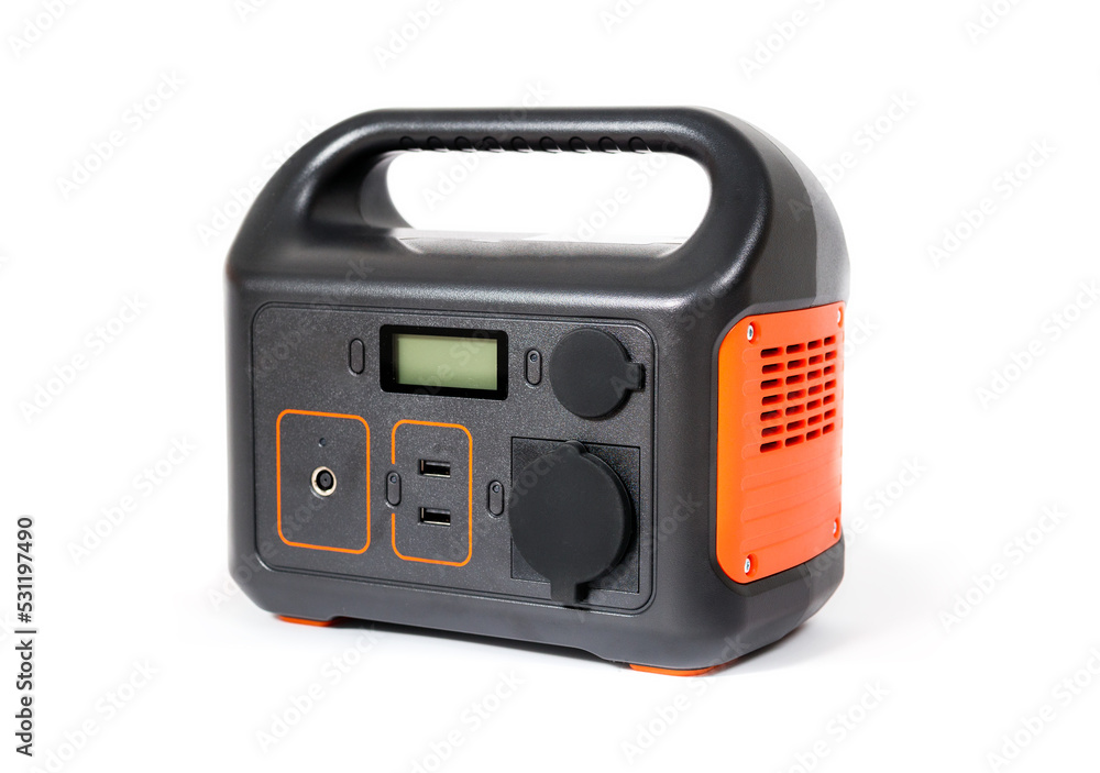 Isolated portable power station. Portable power supply battery to use for camping, fishing, hunting or during power outages. Selective focus. Isolated portable power station. Portable power supply battery to use for camping, fishing, hunting or during power outages. Selective focus.