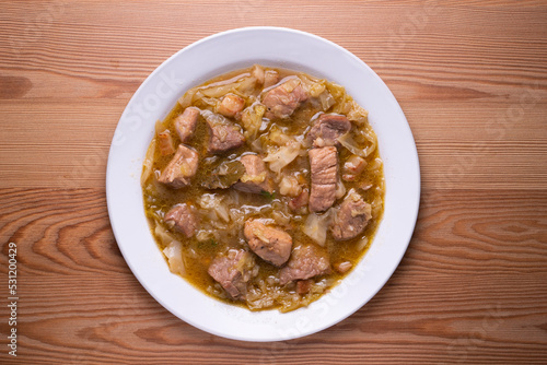 Pork stew with white cabbage. Typical Spanish winter recipe.