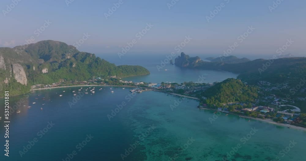 Aerial view of PhiPhi Don islands Travel Landmark of Krabi, Thailand. Amazing Drone shot of Phi Phi island with beautiful blue turquoise seawater tropical beach. Tourist attraction in summer holidays. Aerial view of PhiPhi Don islands Travel Landmark of Krabi, Thailand. Amazing Drone shot of Phi Phi island with beautiful blue turquoise seawater tropical beach. Tourist attraction in summer holidays.