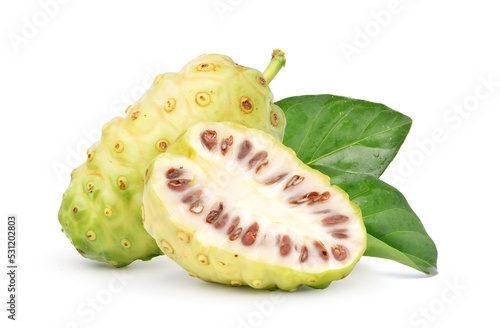 Noni or Morinda Citrifolia fruit with cut in half and leaf isolated on white background. Clipping path. photo