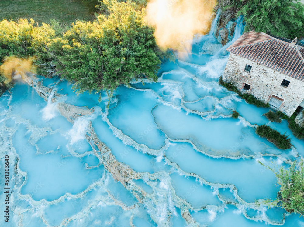 View from above, stunning aerial view of Le Cascate del Mulino, a group of  beautiful hot springs in the municipality of Manciano, Tuscany. Stock Photo  | Adobe Stock