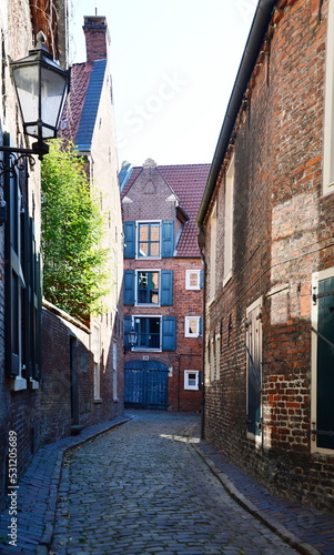 Narrow Street in the Old Town of Leer, East Frisia, Lower Saxony photo