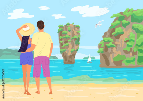 Man and woman on the beach in Thailand. The famous island near Phuket in Thailand. Travel photo of island with beautiful sandy beach in Phang Nga bay, Thailand.