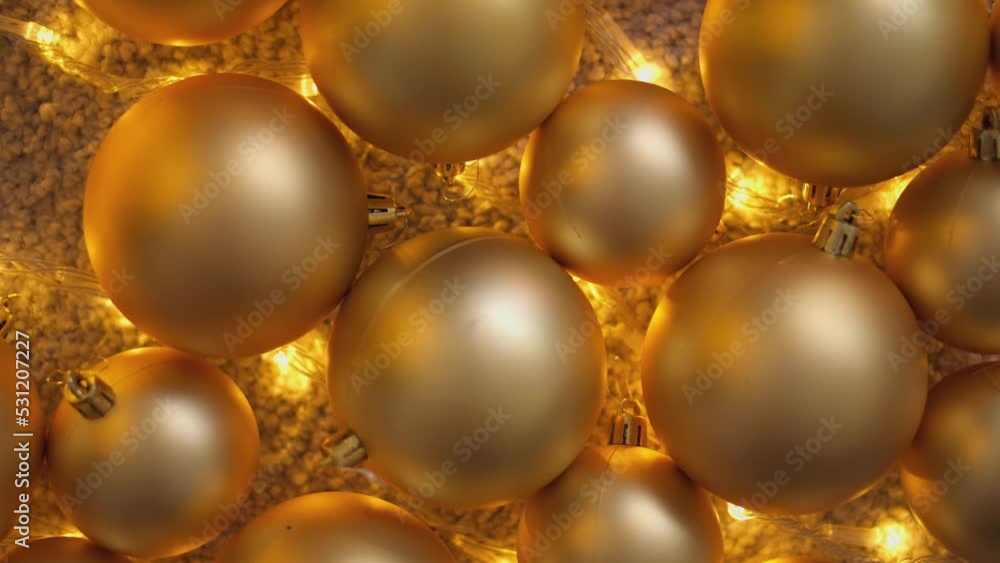 Christmas balls background. Christmas decorations close-up. Red and gold Christmas tree balls. New Year's decor for festive winter atmosphere of home comfort. Season winter rest, holiday. Abstraction. Christmas balls background. Christmas decorations close-up. Red and gold Christmas tree balls. New Year's decor for festive winter atmosphere of home comfort. Season winter rest, holiday. Abstraction.
