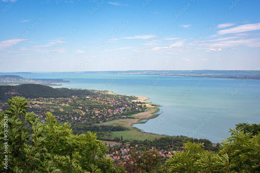 Aerial view of Lake Balaton and the village of Ábrahámhegy, Hungary from the summit of Mount Badacsony in northeasterly direction.
