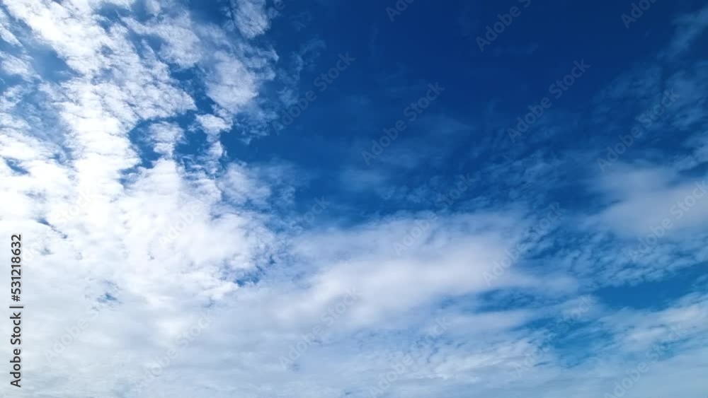 Blue sky with clouds. Cloud time lapse. Nature background. Landscape white clouds 4K.Nature weather blue sky. Puffy fluffy white clouds. Blue sky with clouds. Cloud time lapse. Nature background. Landscape white clouds 4K.Nature weather blue sky. Puffy fluffy white clouds.