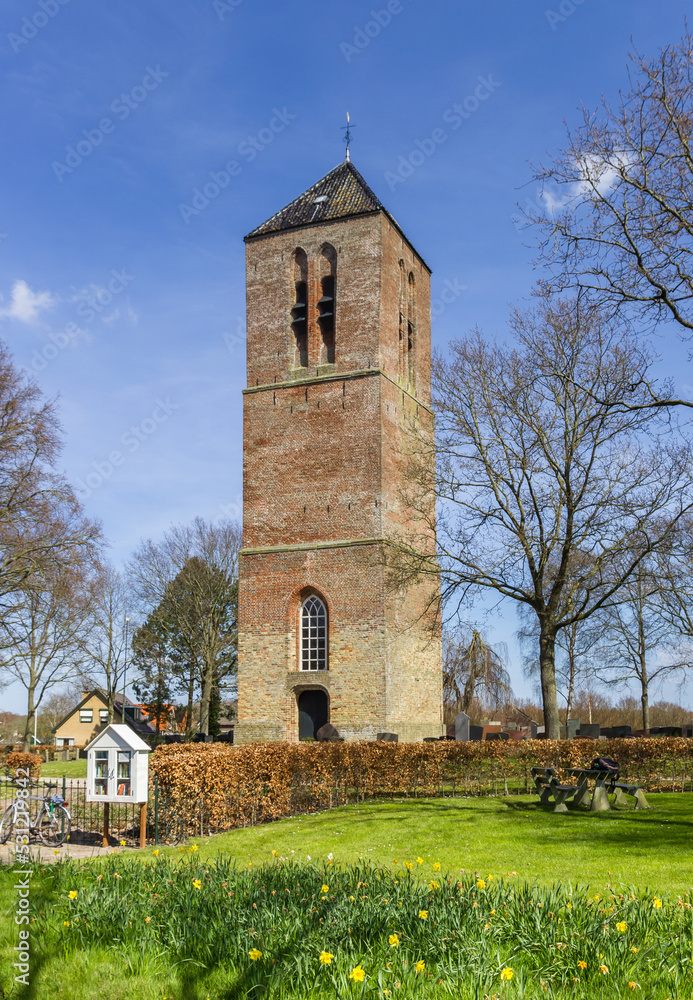 Historic church tower in small village Nijemirdum, Netherlands