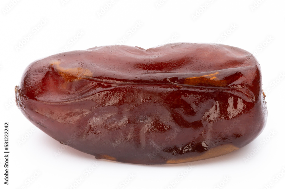 Dry dates isolated on white background. Top view. Flat lay pattern. Dry dates isolated on white background. Top view. Flat lay pattern.