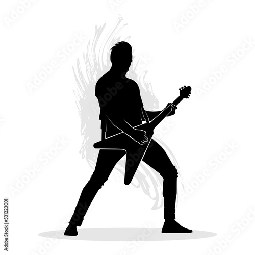 Silhouette of man playing electric guitar.