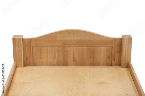 View of the back of a wooden bed for sleeping.
